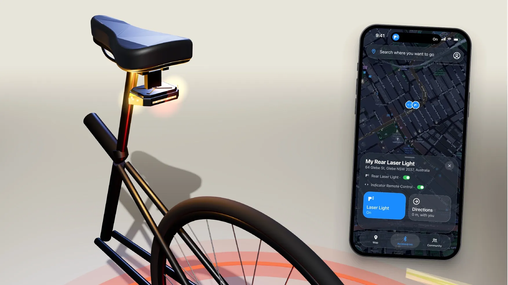 A bike seat post with the rear laser light mounted under the saddle, beside the app's accessory screen on a phone
